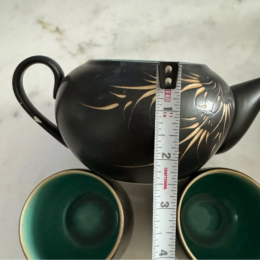 Carved Vietnamese tea kettle set with 2 small tea cups